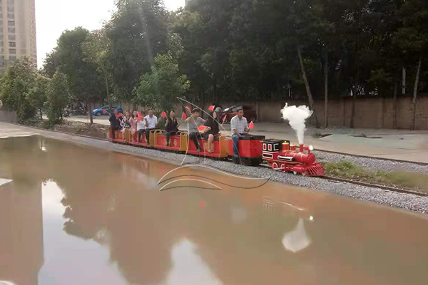 Ride-on Track Train on Water Side